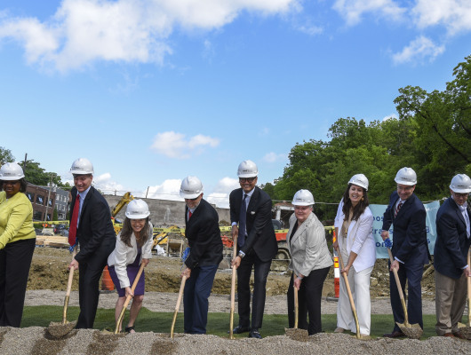People breaking ground 
